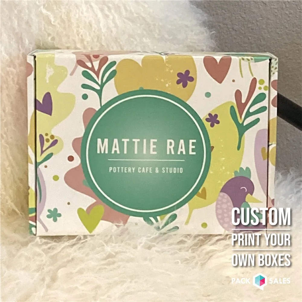 Floral custom mailer box with a green center label