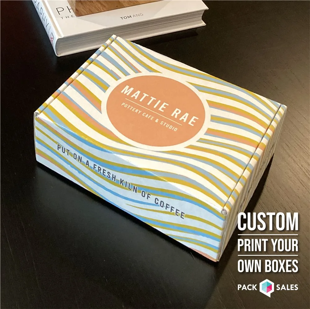 Striped custom mailer box photographed at an angle