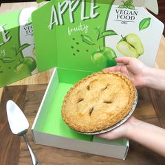 Green custom mailer with 'Apple' and fresh baked pie inside