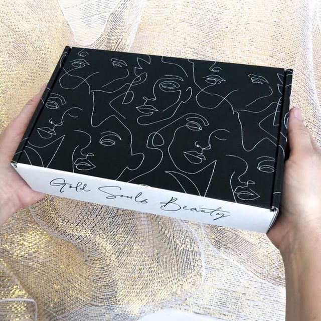 Black custom mailer with white squiggle pattern