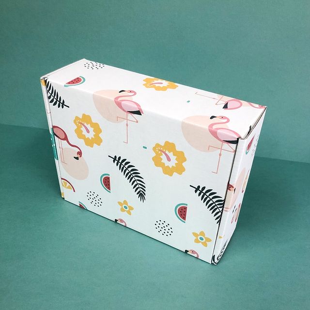 White mailer with hand-drawn lemons and oranges