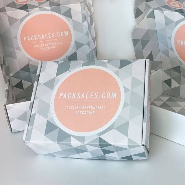 Pouch mailers with orange bakery logo &ndash; displayed with cookies