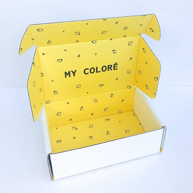 Yellow 'MY COLOR' mailer with playful black and red text