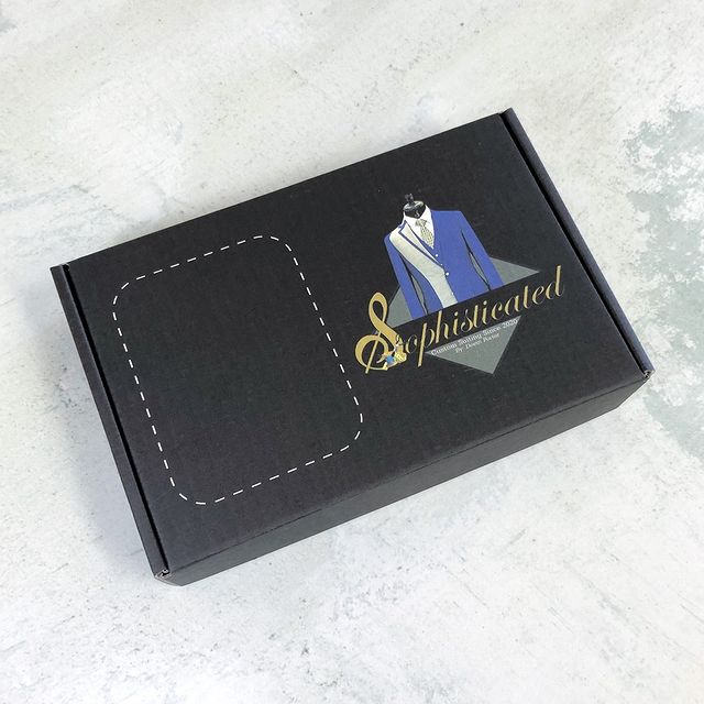 Black and navy box with luxury branded print
