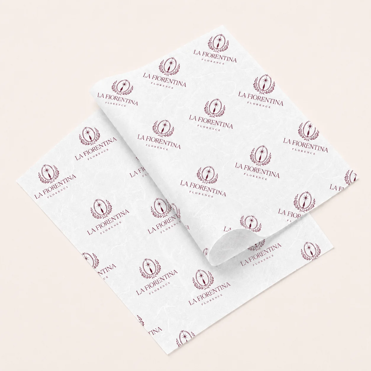 Premium white tissue paper printed with a repeating custom logo